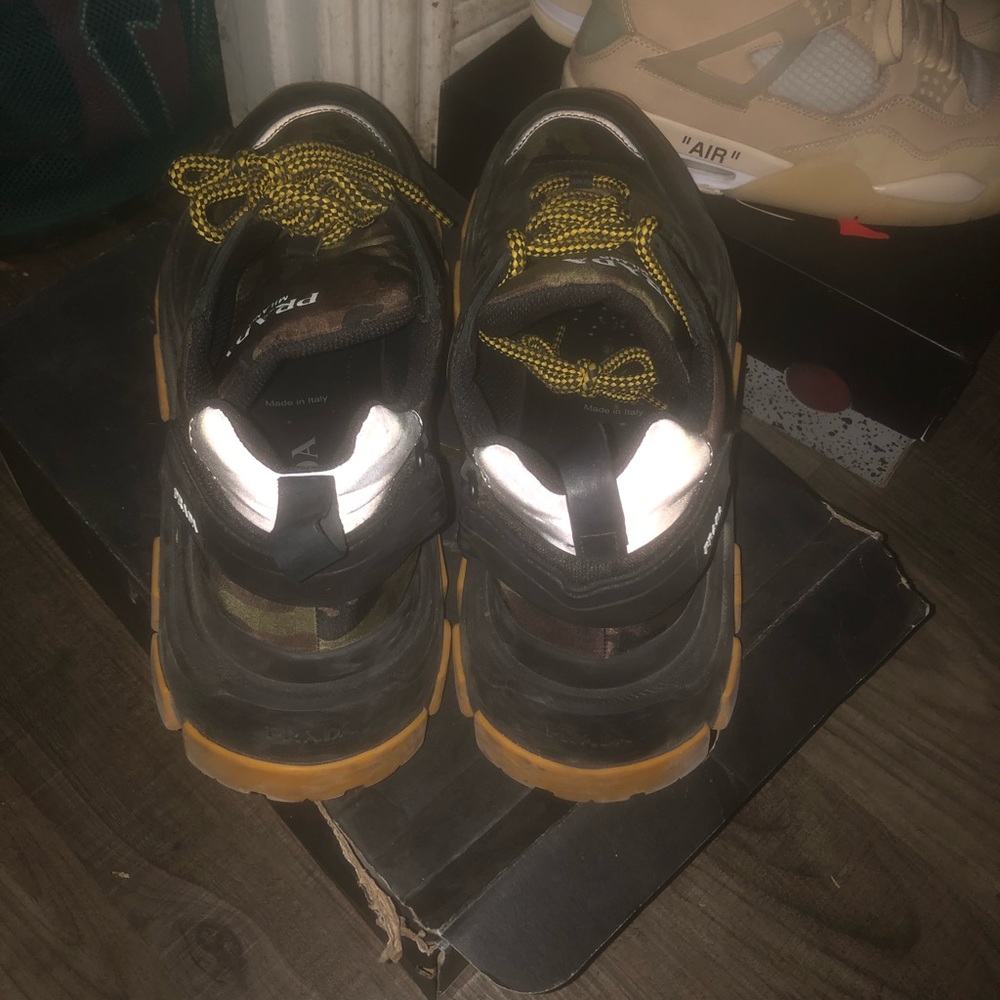 Prada shoes new they go for 850 they are used asking 300 serious buyers only.
